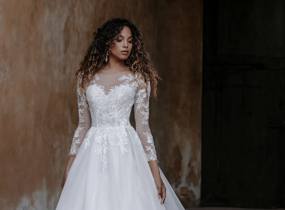 Trending Fabrics and Silhouettes: The Latest Wedding Dress Styles for Fall Brides Image