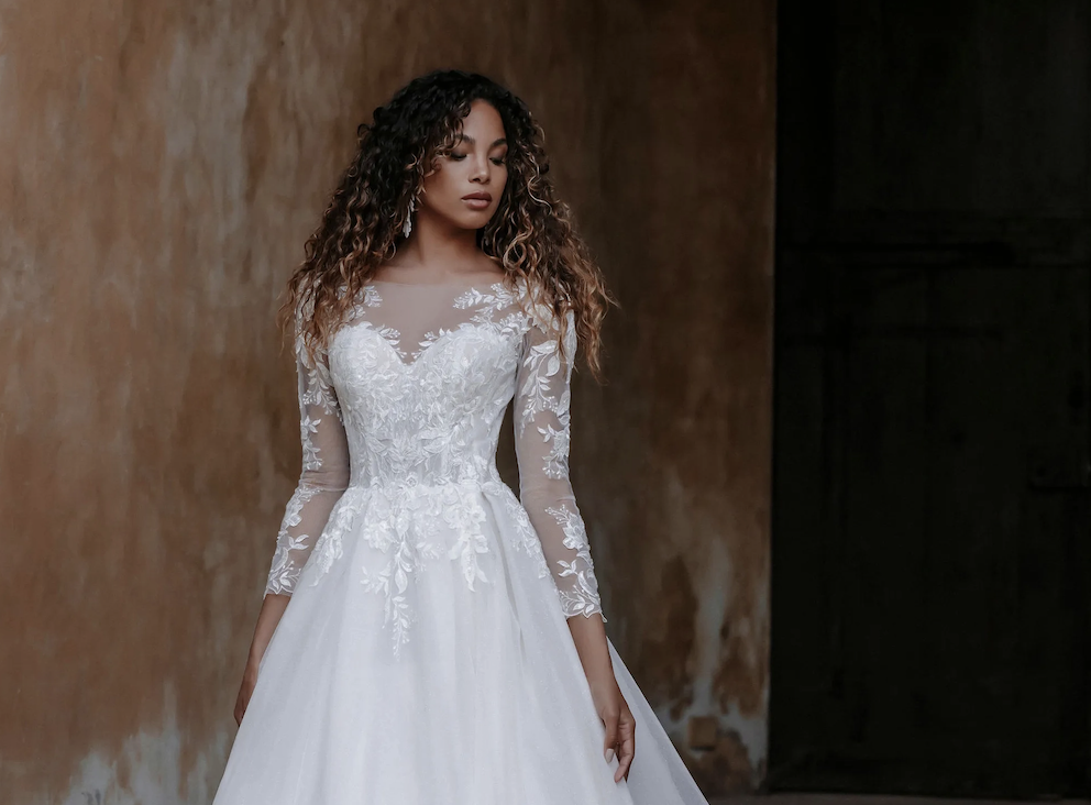 Trending Fabrics and Silhouettes: The Latest Wedding Dress Styles for Fall Brides. Mobile Image