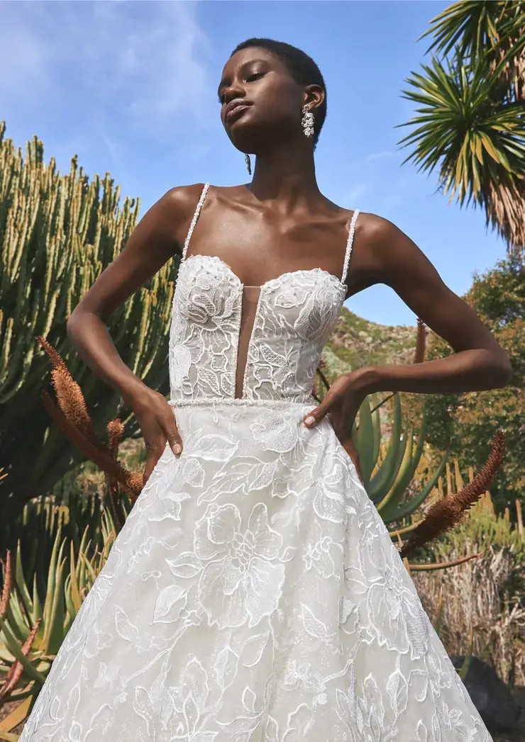 Model wearing a white gown by Pronovias